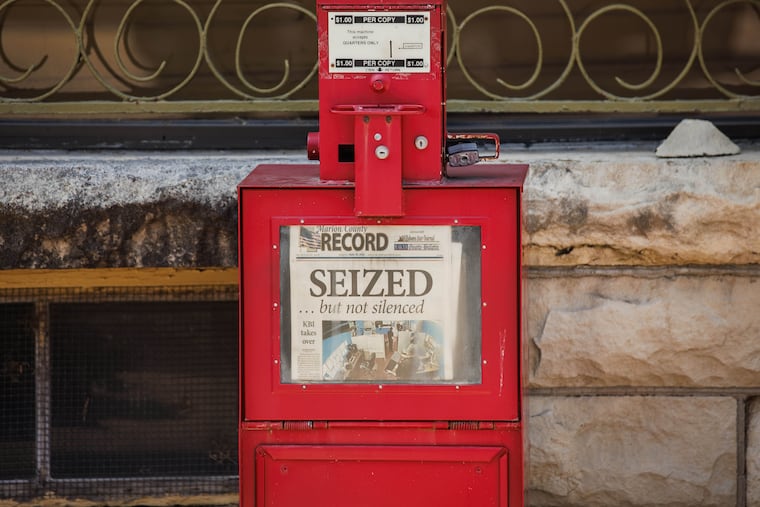 The first issue of the Marion County Record, in Marion, Kan., after police raided its offices on Aug. 21, 2023. With a free press under siege, Jim Friedlich writes that collective action by news organizations might be the best response to threats.