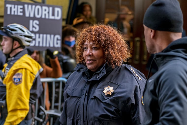 Philadelphia Sheriff Rochelle Bilal (center) as protesters gather outside the Union League of Philadelphia on Jan. 24.