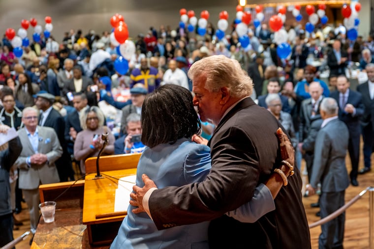 Bob Brady, chair of the Philadelphia Democratic City Committee, embraces Cherelle Parker (left) after calling her to the stage during the United Democratic Spring Dinner at the Sheetmetal Workers banquet hall on Tuesday.