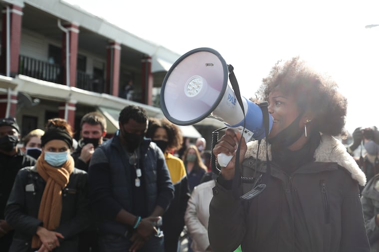 YahNé Ndgo speaks to the crowd at 56th and Pine Streets as they protest Saturday the police shooting death of Walter Wallace Jr.