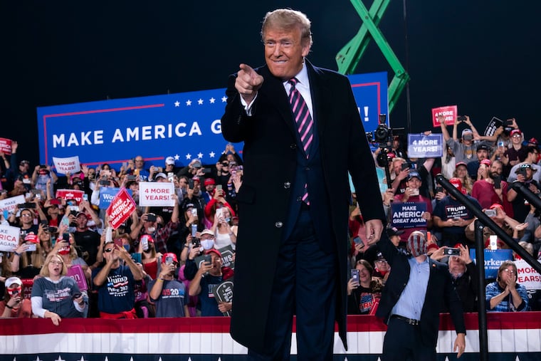 President Donald Trump arrives Tuesday to speak to a campaign rally at Pittsburgh International Airport.